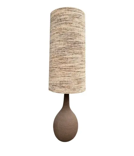 A large French 1960S biscuit fired pottery floor lamps with orignal shade.
