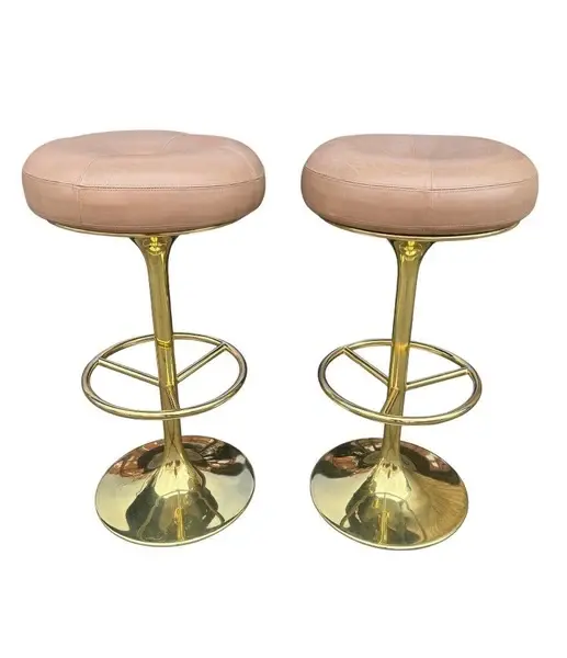 A pair of Italian 1970s gilt metal and leather bar stools
