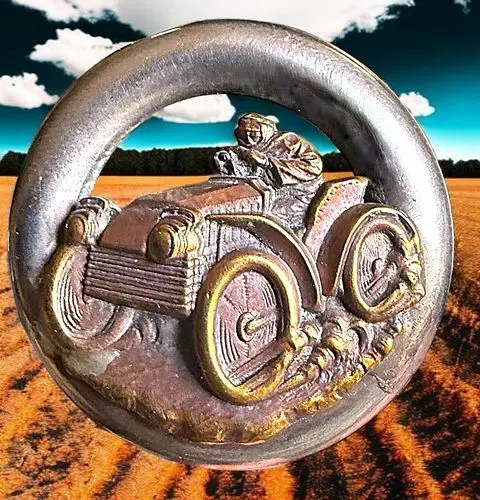 A DIVISION ONE PICTORIAL CAR AND DRIVER BUTTON