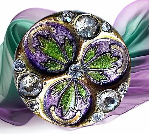 A DIVISION ONE ENAMEL AND JEWELED BUTTON