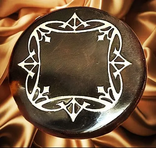 A DIVISION ONE HORN AND TORT INLAY BUTTON