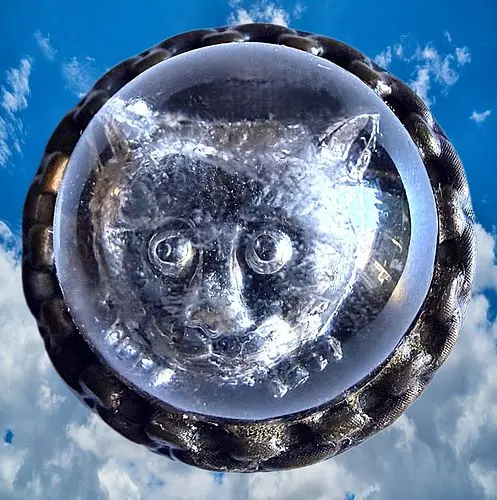 A VERY UNSUAL AND RARE GLASS IN METAL BUTTON