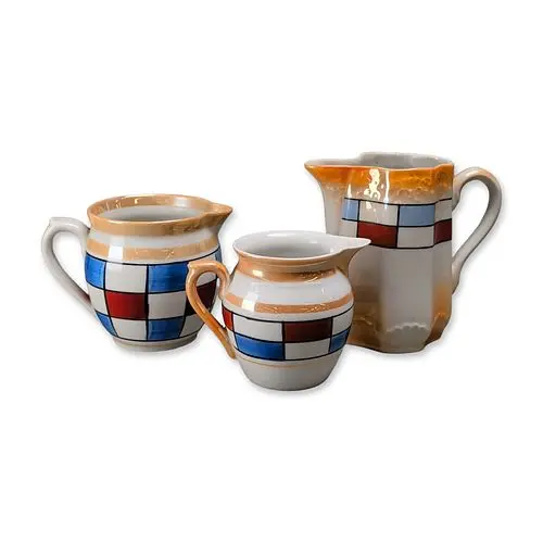 Group of Three Art Deco Lusterware Porcelain Creamers and Pitchers