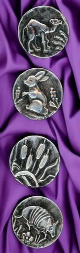 A SMALL CARD OF DIVISION THREE STUDIO ARTIST BUTTONS