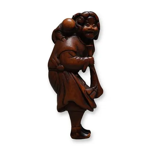 Japanese Wood Netsuke of a Dutchman with Boy and a Trumpet, Signed
