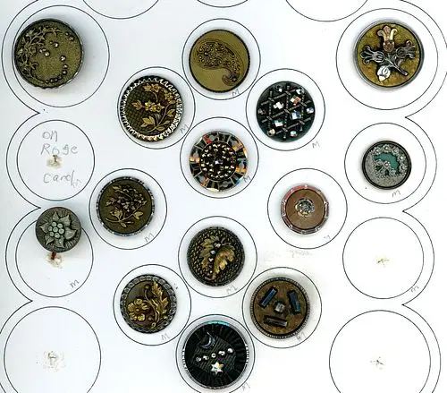 A PARTIAL CARD OF DIVISION ONE STEEL CUP BUTTONS