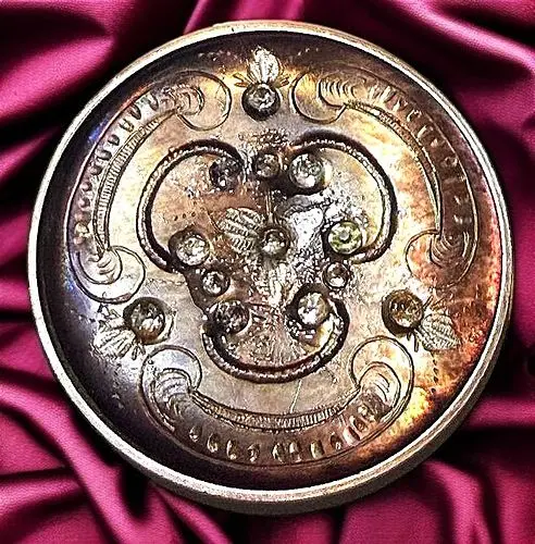A DIVISION ONE ENGRAVED PEARL AND PASTE BUTTON