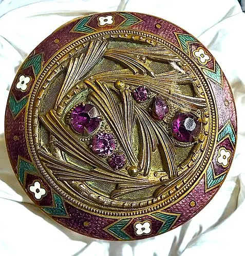 A DIVISION ONE ORNATE JEWLED BUTTON