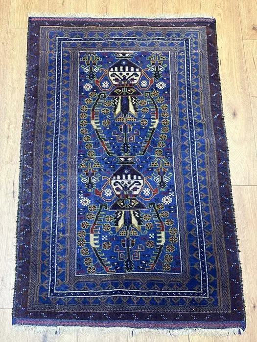 Hand-knotted Oriental rug in the traditional...