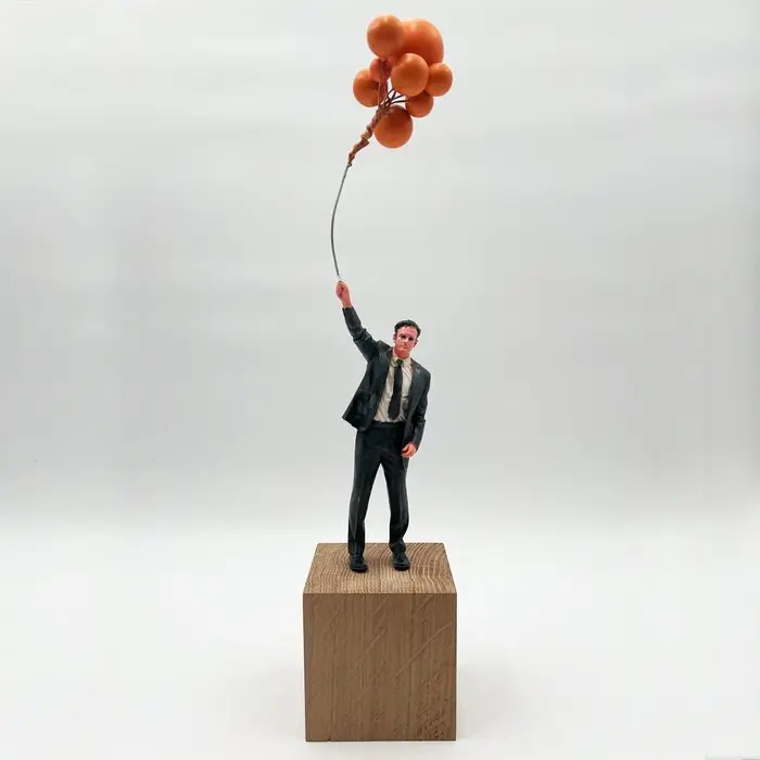 Coco de Paris - Man with orange balloons