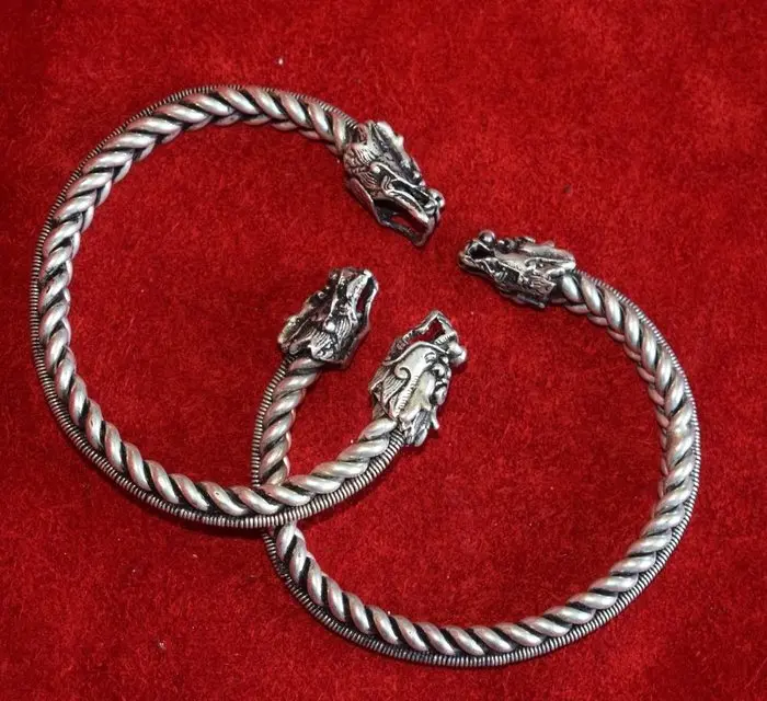 Pair of two dragon cuff bracelets