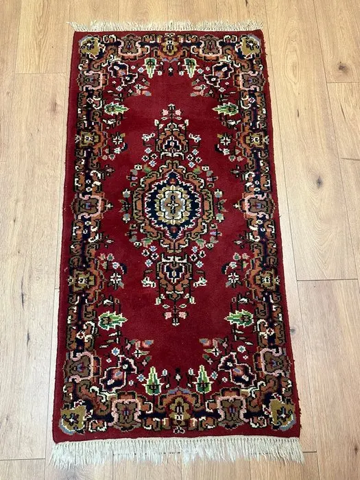 Hand-knotted Indo-Kerman rug with a classic medallion...
