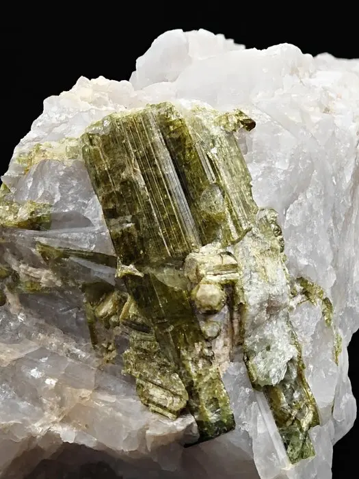 Rare pseudomorphism of tourmaline in green lepidolite...
