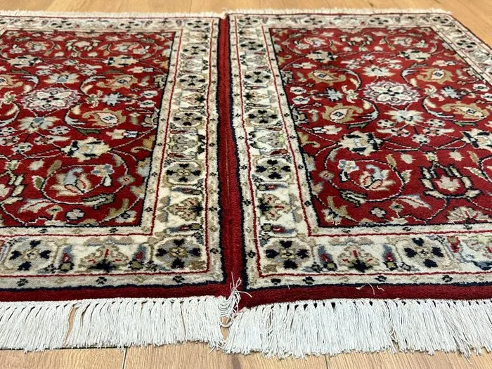 Exquisite pair of carpets in Isfahan style