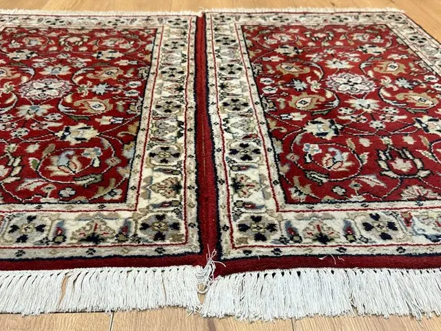 Exquisite pair of carpets in Isfahan style