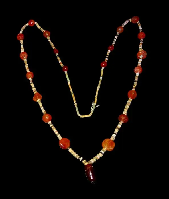 Ancient Egyptian - Necklace of faceted carnelian beads...