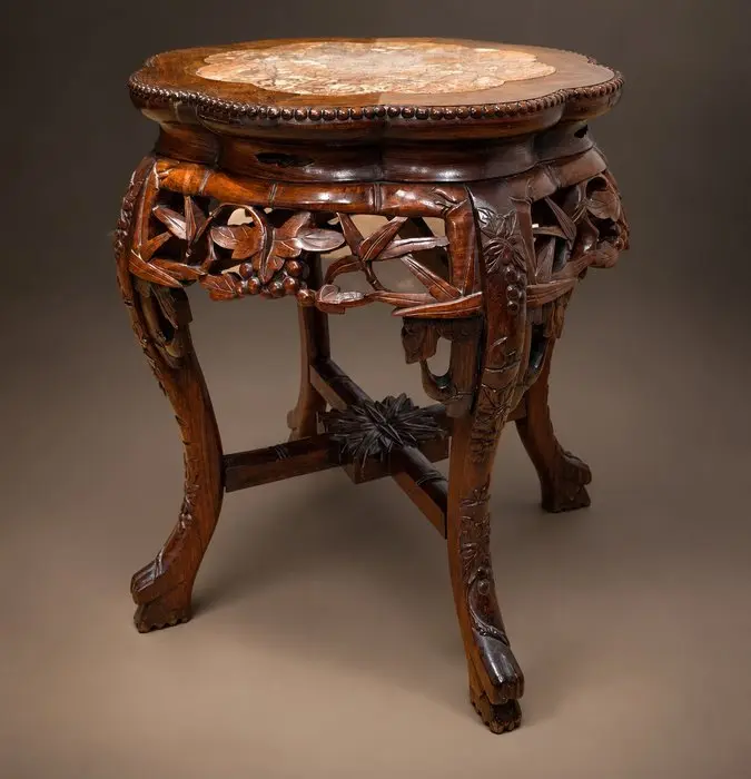 Antique wooden side table with refined carving