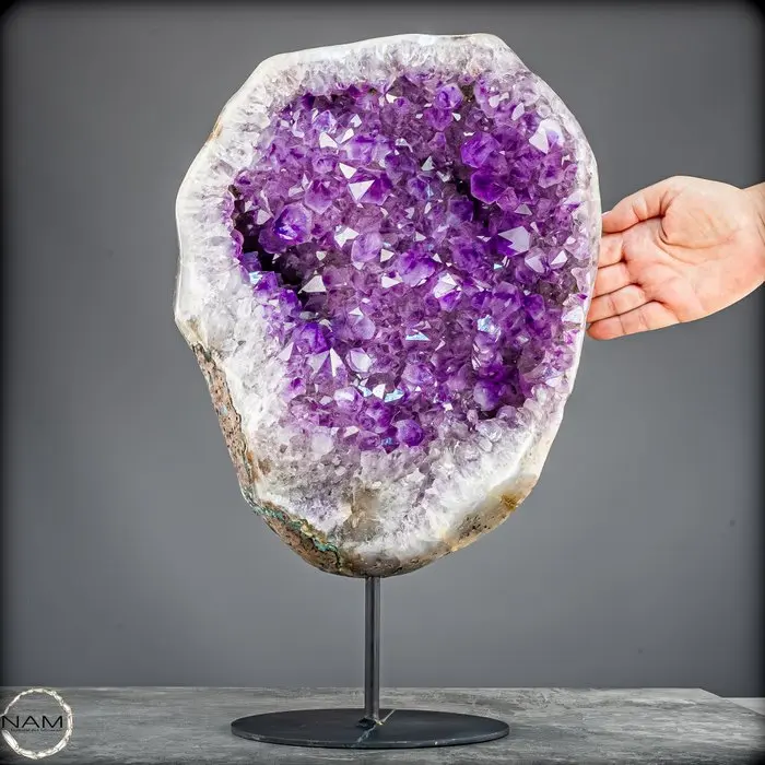 Stunning amethyst on a stand — majestic crystal energy in an elegant display