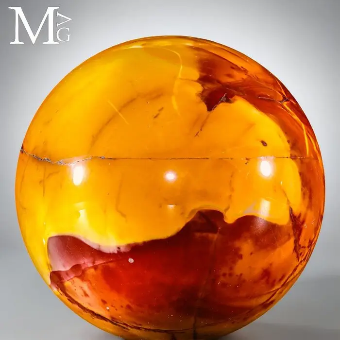 Splendid Mookaite jasper with earthy red tones and golden-yellow hues