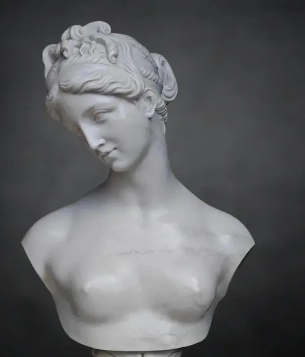 Hand-sculpted marble with a marble finish. Bust - 24 cm