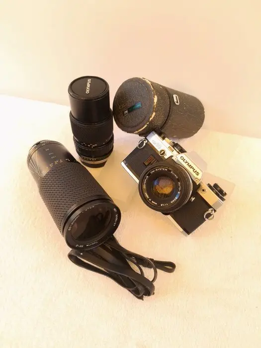 Olympus OM-10 + 50 mm f 1.8 Zuiko + Zoom Zuiko 75/150 f.4...