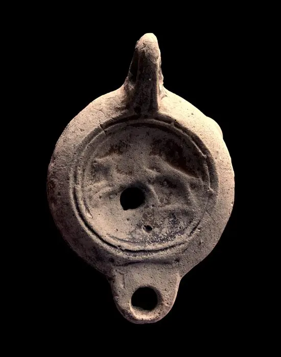 Ancient Roman - Oil lamp - bust of a young woman - potter's mark L MVN PHILE