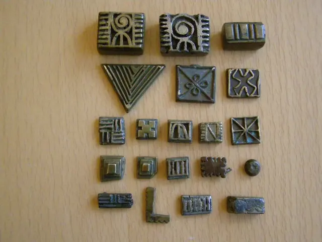 Twenty antique geometric gold weights