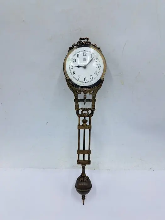 Mystery clock - Bronze, Brass, Glass