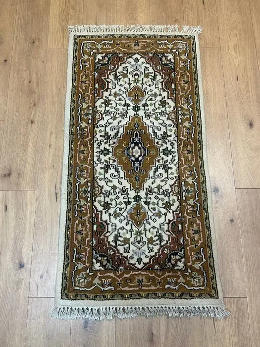 Exquisitely hand-knotted Oriental rug in Tabriz style...