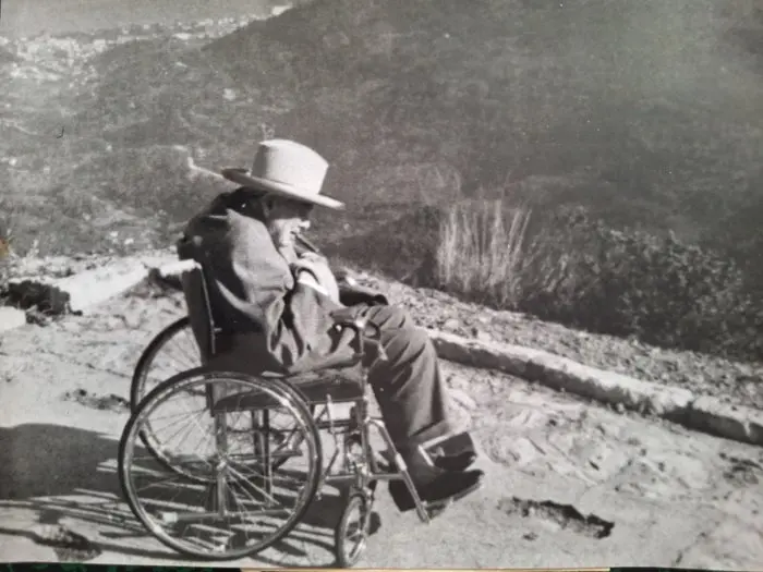 Associated Press - Sir Winston Churchill smoking a cigar at Col de la Madone