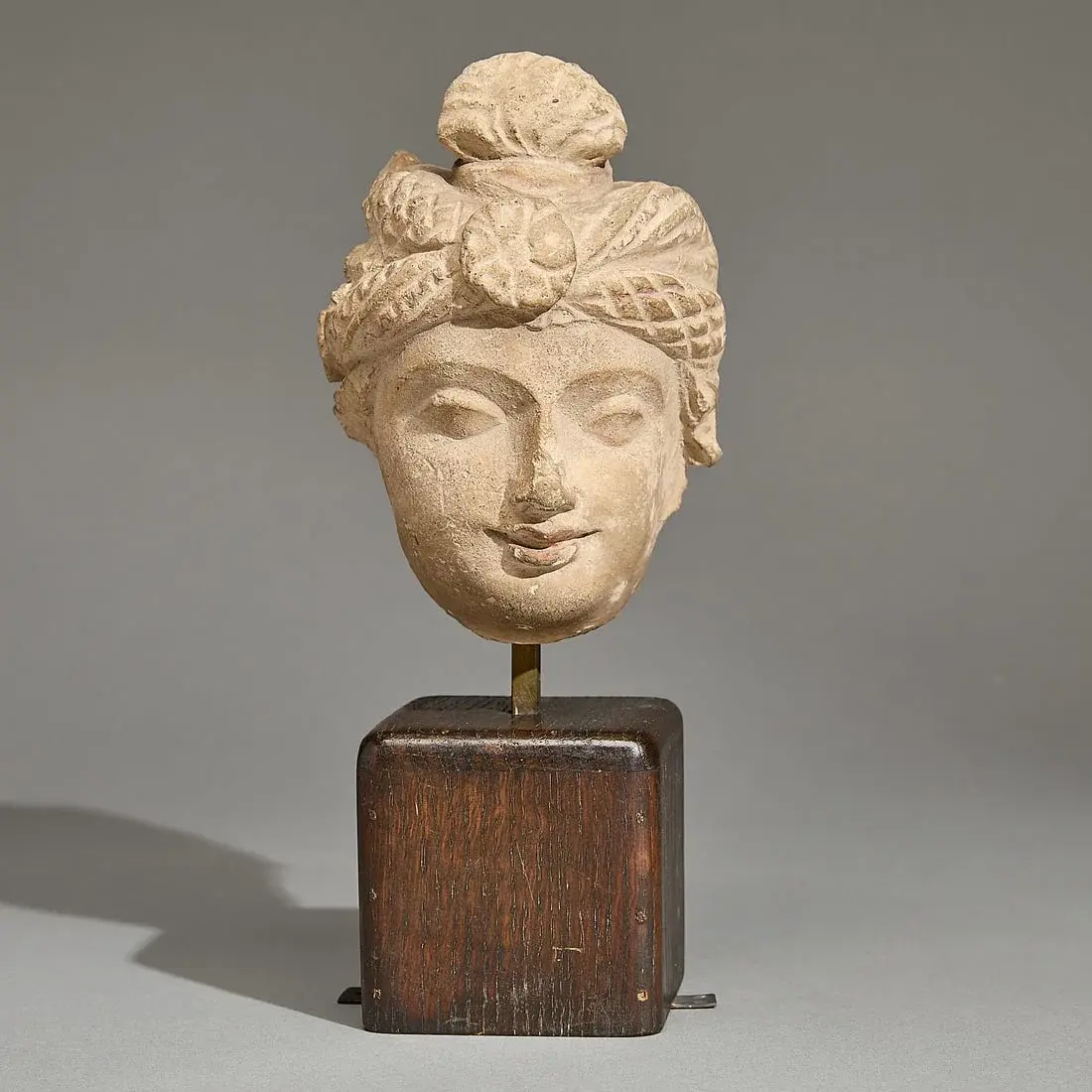 Ancient Gandharan Stucco Head of Buddha Attendant