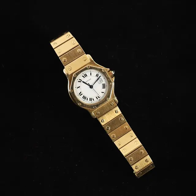 BEAUTIFUL "SANTOS OCTOGONALE" MEN'S WATCH BY CARTIER IN GOLD - Lot 95