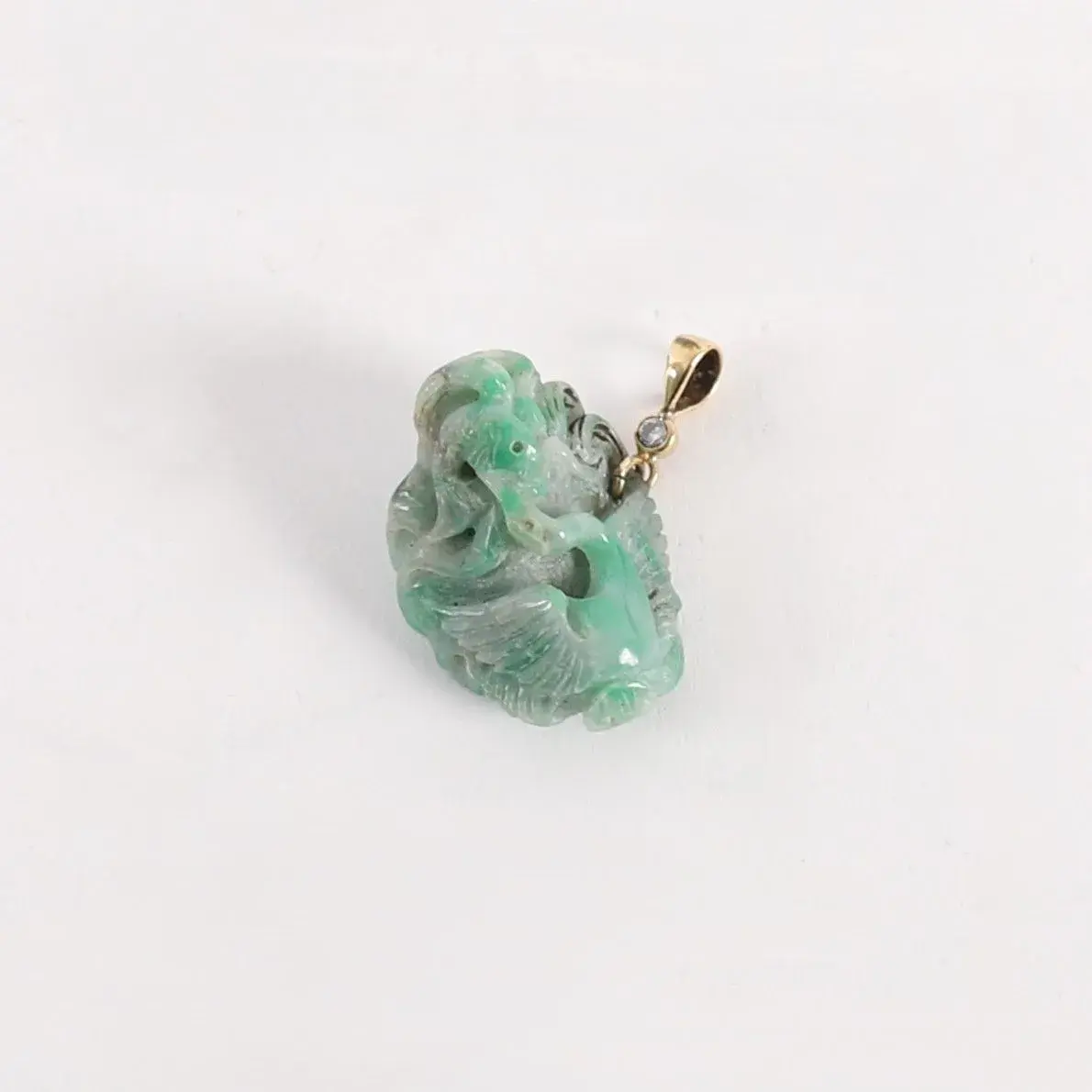 GOLD, JADE, AND DIAMOND PENDANT - Lot 33