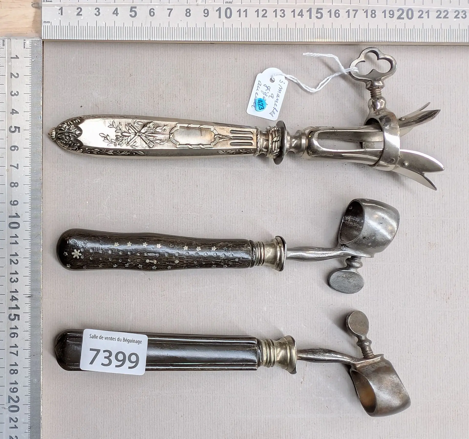 3 antique leg-of-lamb handles—2 ebony, 1 silver-plated—See photos