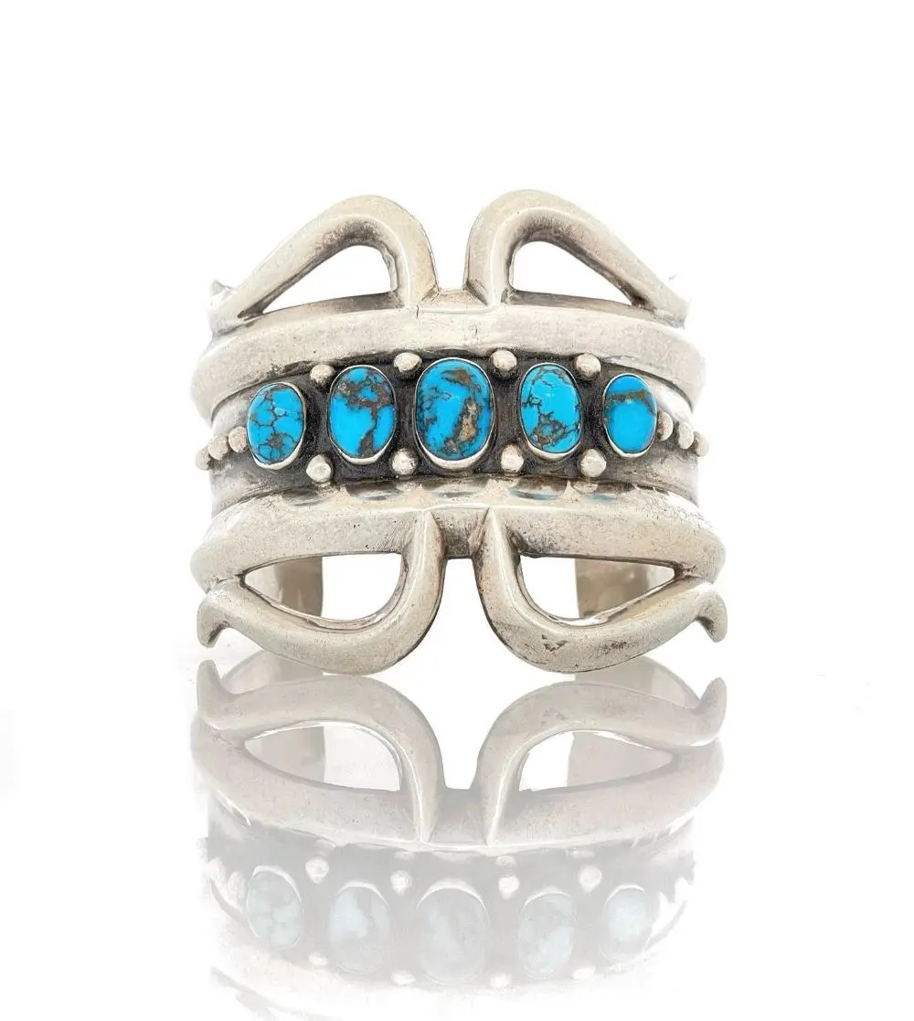 M.R.V. NATIVE AMERICAN STERLING SILVER TURQUOISE SAND CAST CUFF