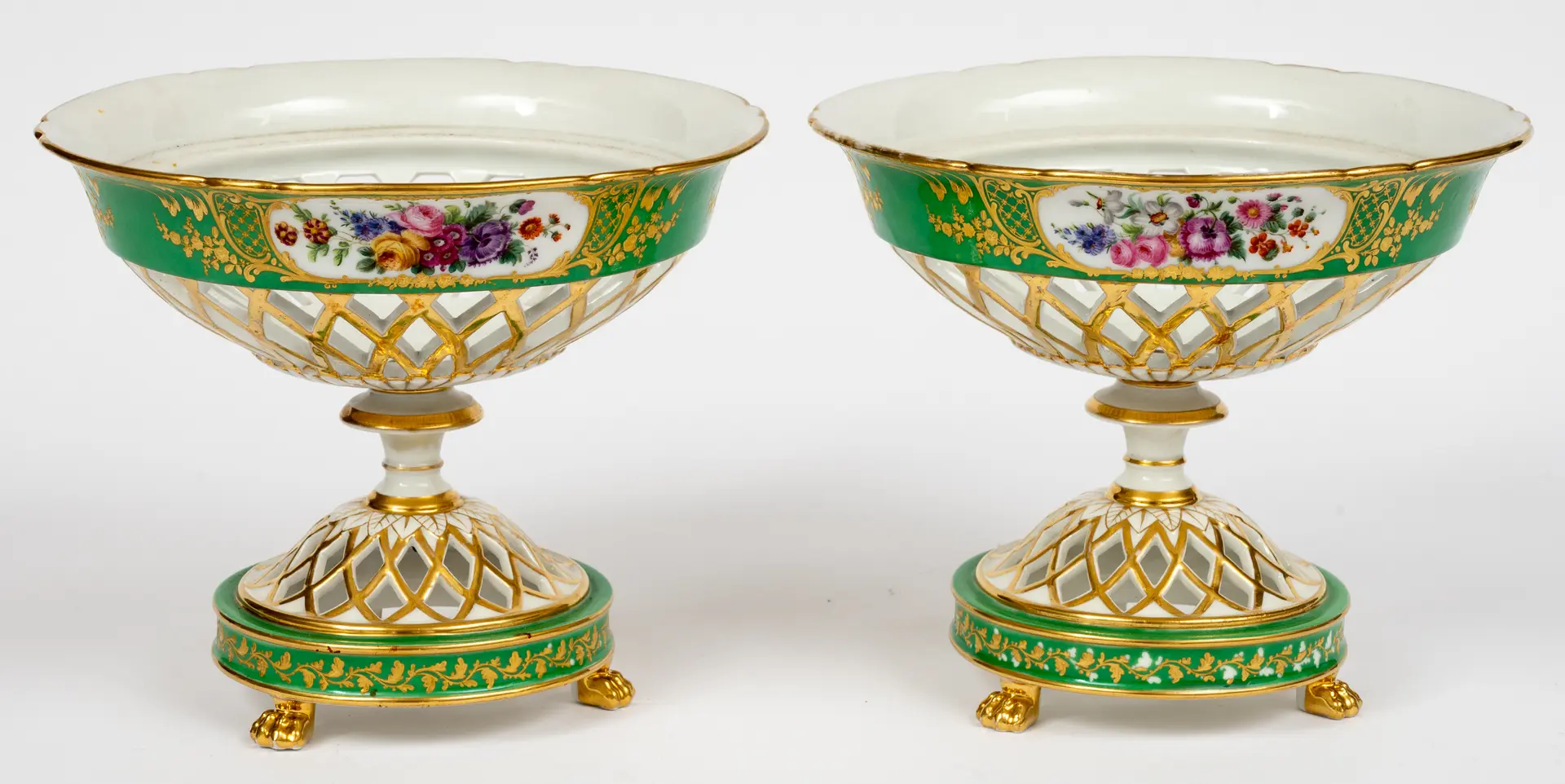 Lot 143: A PAIR OF OPEN-WORKED TABLE CENTERPIECES