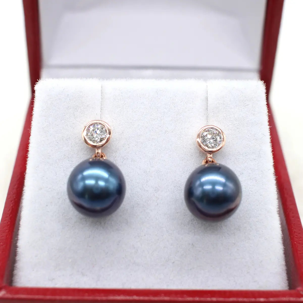 IRIDESCENT PEARL & DIAMOND EARRINGS.