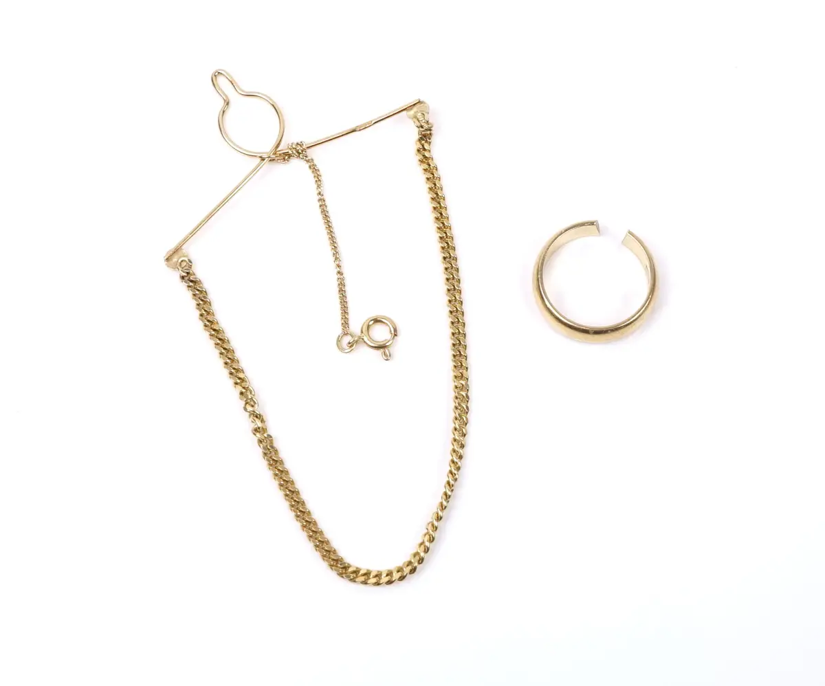 Clip e anello per cravatta, oro 18K.