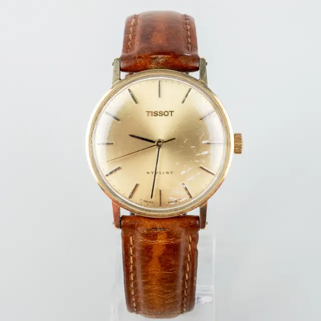 OROLOGIO DA POLSO DA UOMO, oro 14k, Tissot, "Stylist", seconda metà del XX secolo