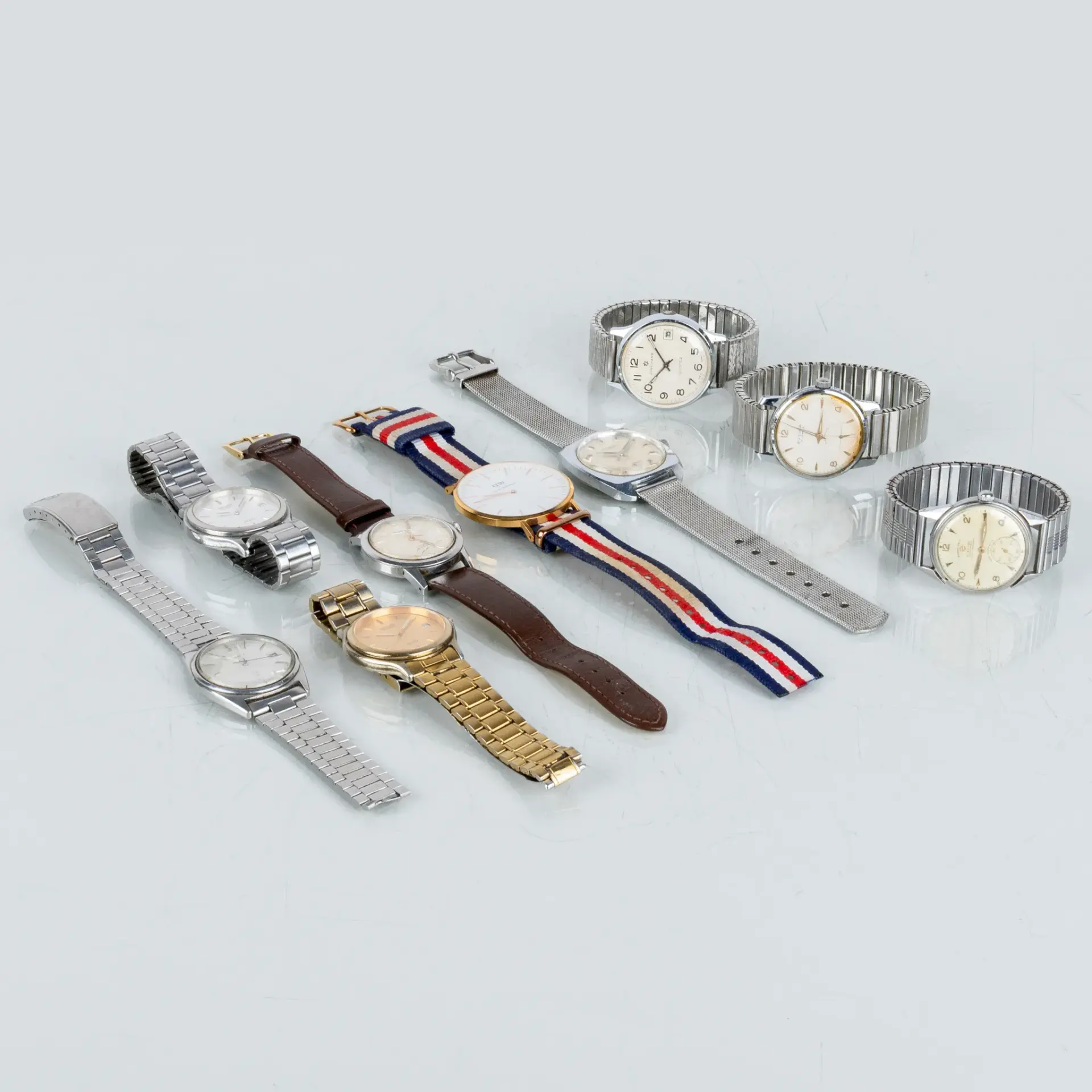 COLLEZIONE DI OROLOGI DA POLSO, 9 pezzi, quarzo e manuale, acciaio, anni 1900/2000