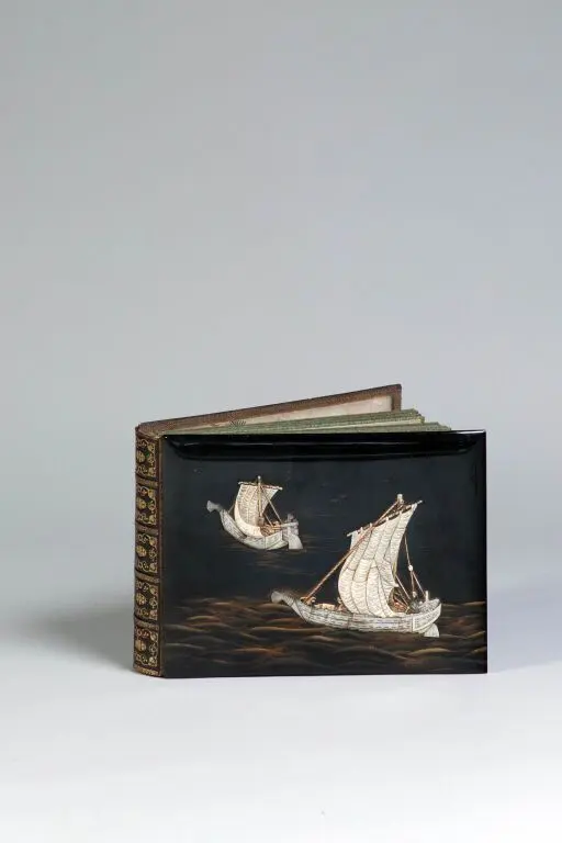 A delightful early 20th-century photo album inspired by Japanese design.