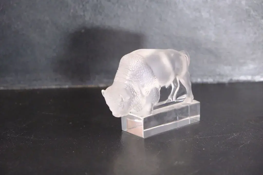 LALIQUE France. Pressed and molded glass bison. Signed on the base.