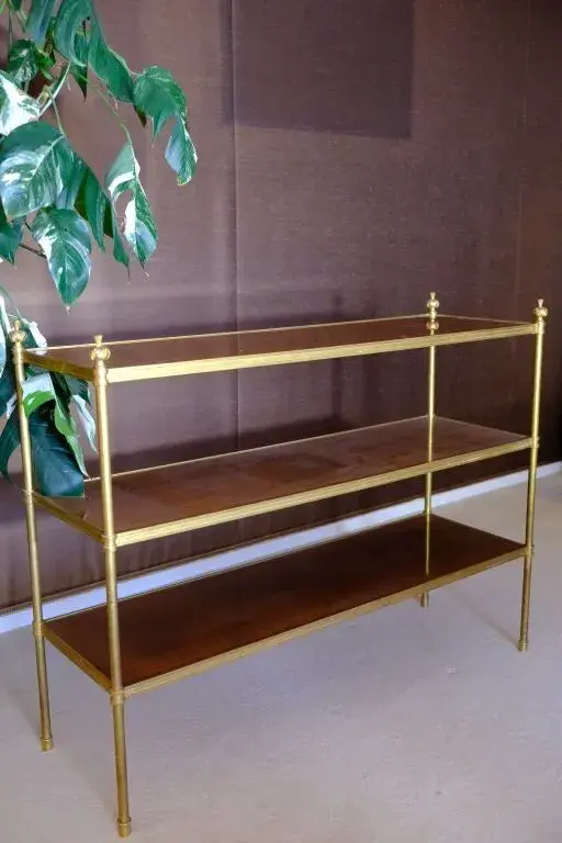 A small rectangular console-style shelf with a mahogany veneer top