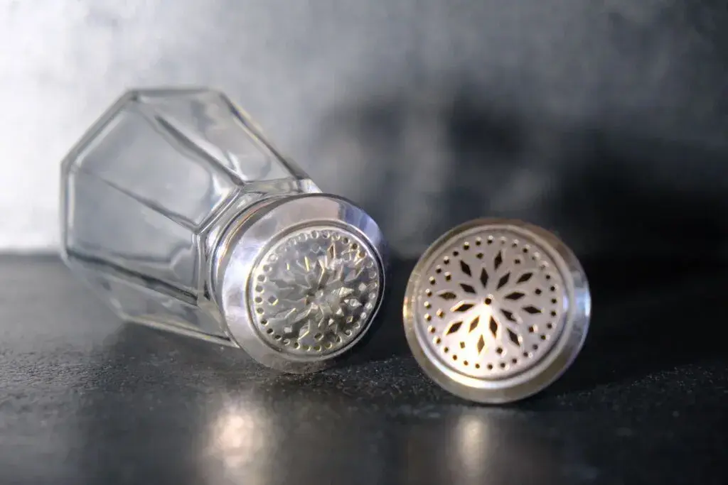 Glass sugar bowl with beveled sides and an 800‰ silver lid. Minerva