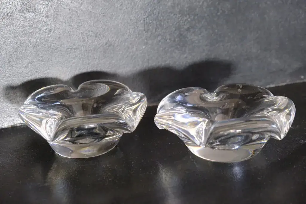 DAUM France. Pair of flower-shaped crystal candlesticks or table centerpieces.