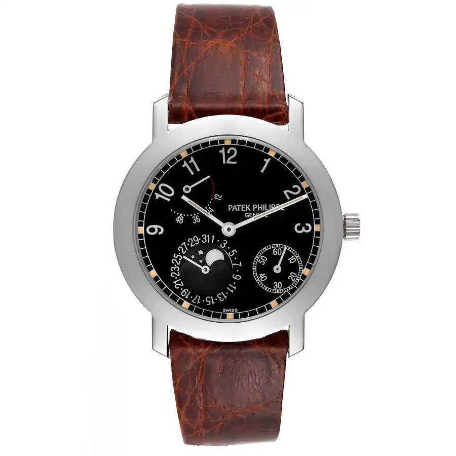Complications (Reference 5055G-001). A 36mm white gold automatic wristwatch