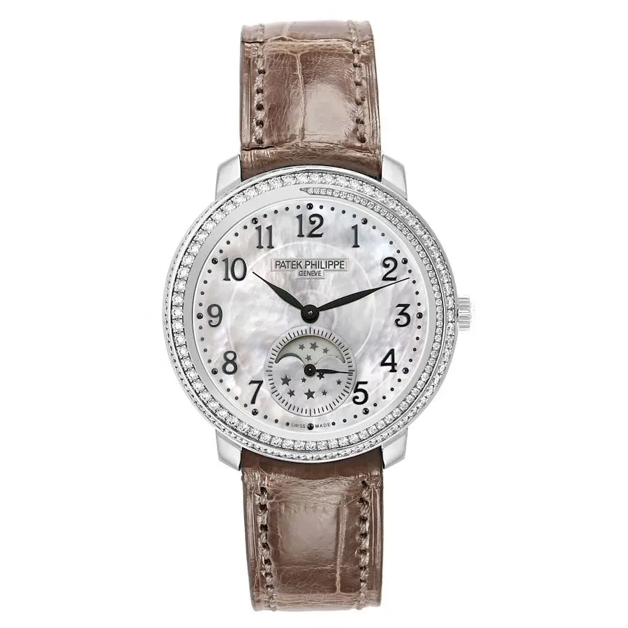 Complications (Reference 4968G-010). A 33mm white gold diamond-set