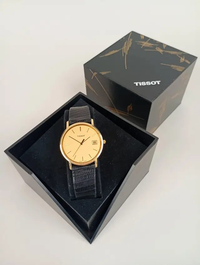 Armbandsur herr, 18 k Guld Tissot quartz