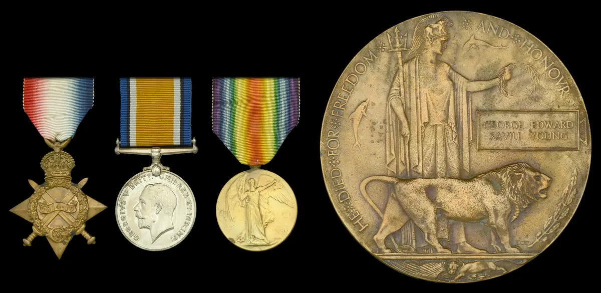 Three: Major G. E. S. Young, Irish Guards, who, having been wounded