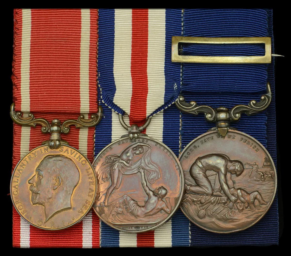 A fine S.G.M. group of three awarded to Able Seaman W. J. Lawry, Mercantile